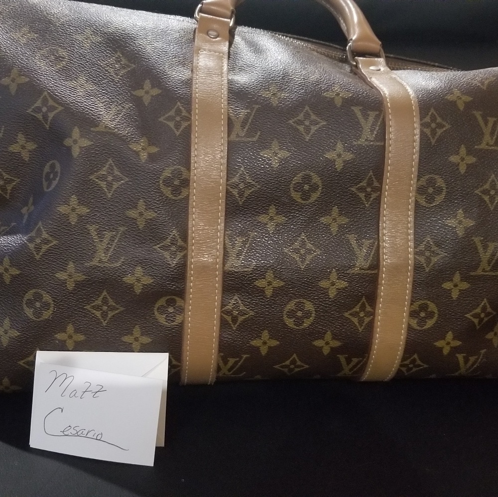 Authentic louis Vuitton French company keepall